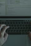 coding on a laptop